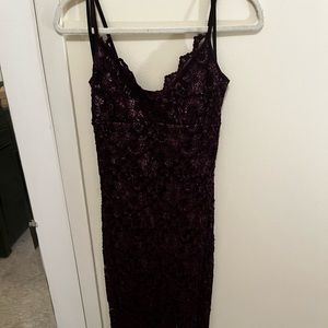 Shimmery plum gown with scalloped lace trim